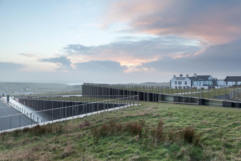 Cover photo of image set from Giants Causway Visitor Centre, designed by Heneghan Peng Architects and located in Bushmills, United Kingdom. All photos by Pawel Paniczko Architectural Photography